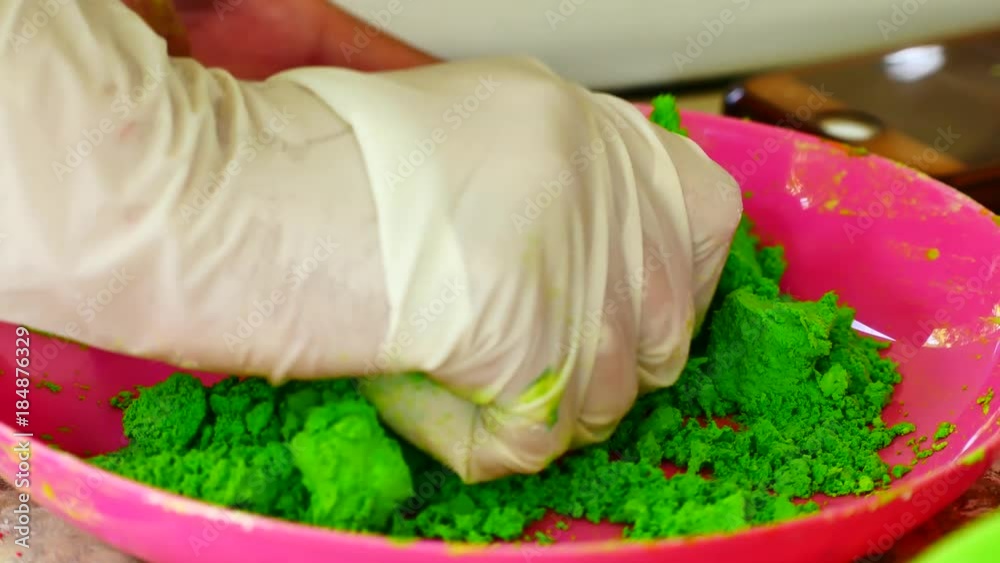 How to make colored powder, holi Festival. The hands are salting food