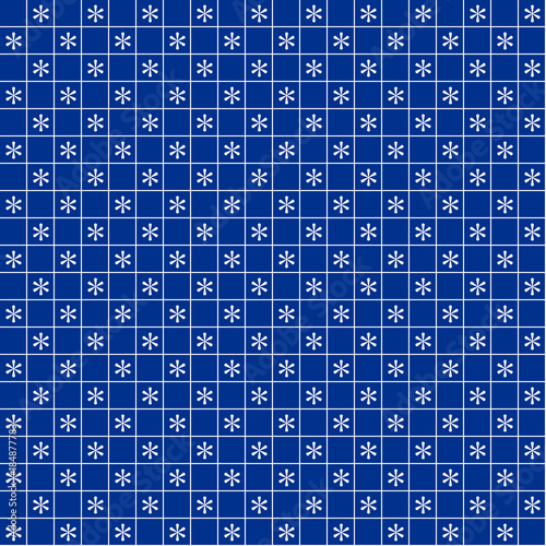 Blue christmas wrapping paper seamless pattern. White snowflakes on the blue background