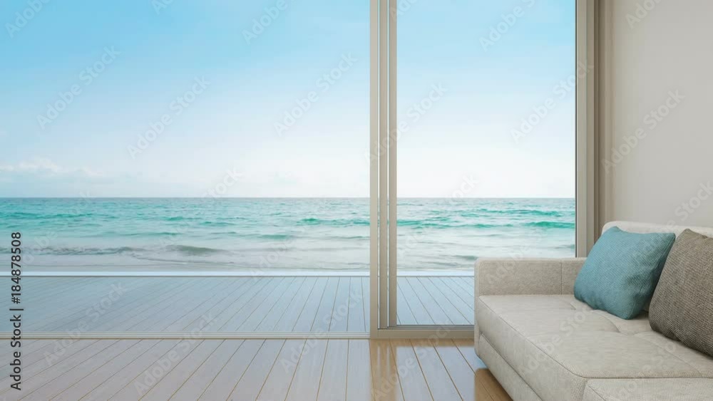 Sofa on wooden floor near glass door with ocean and sky background at luxury apartment, Lounge in sea view living room of modern beach house or hotel - Summer home interior 3d illustration