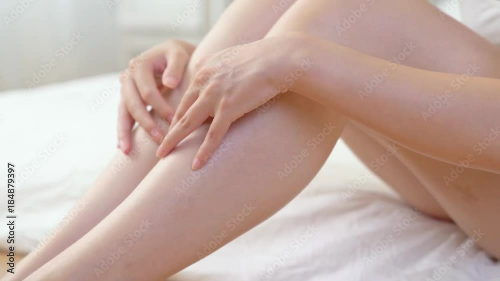 girl touching long leg smoothly up.