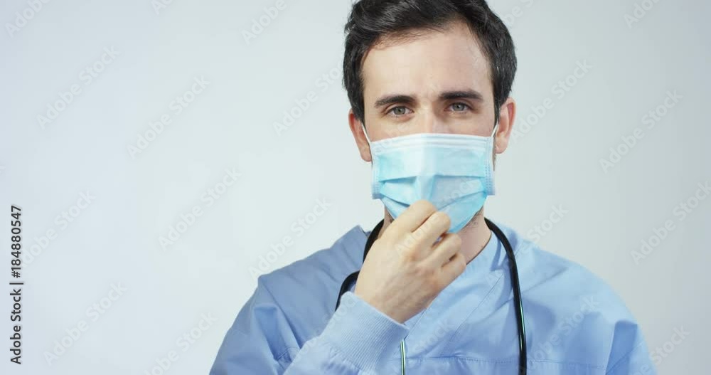 Portrait of a physician or surgeon who looks proud room, happy and smiling for his work in the clinic or hospital. Concept: doctor, patient care, health and wellness in hospitals or private clinics Portrait of a physician or surgeon who looks proud room, happy and smiling for his work in the clinic or hospital. Concept: doctor, patient care, health and wellness in hospitals or private clinics