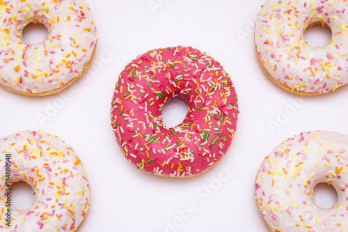 Pink glazed donuts on a white background