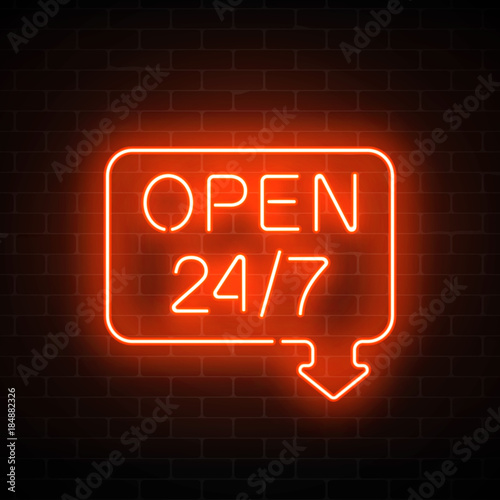 Neon open 24 hours 7 days a week sign in geometric shape with arrow on a brick wall background.