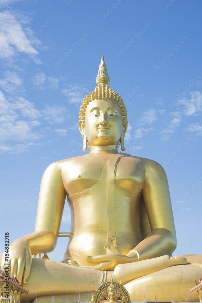 Golden Buddha statue at Wat Muang temple in Angthong, Thailand Golden Buddha statue at Wat Muang temple in Angthong, Thailand