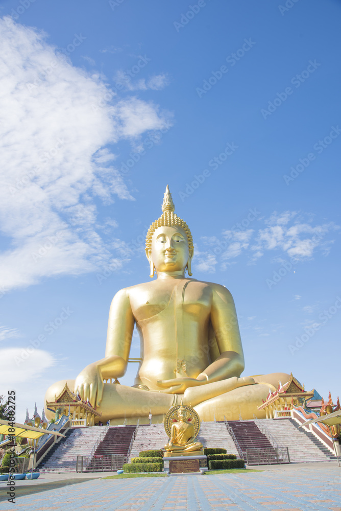 Golden Buddha statue at Wat Muang temple in Angthong, Thailand Golden Buddha statue at Wat Muang temple in Angthong, Thailand
