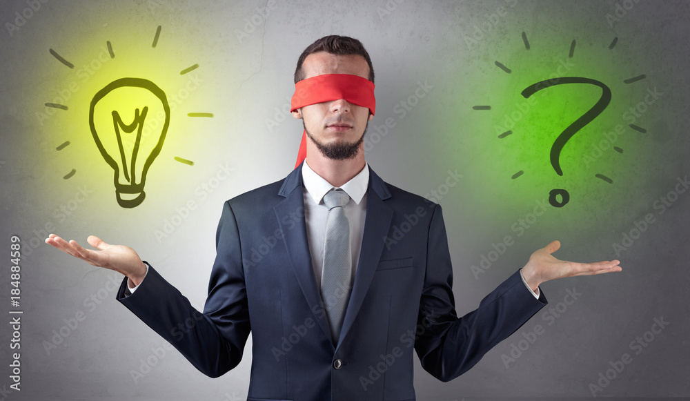 Businessman with idea versus question concept Businessman with idea versus question concept