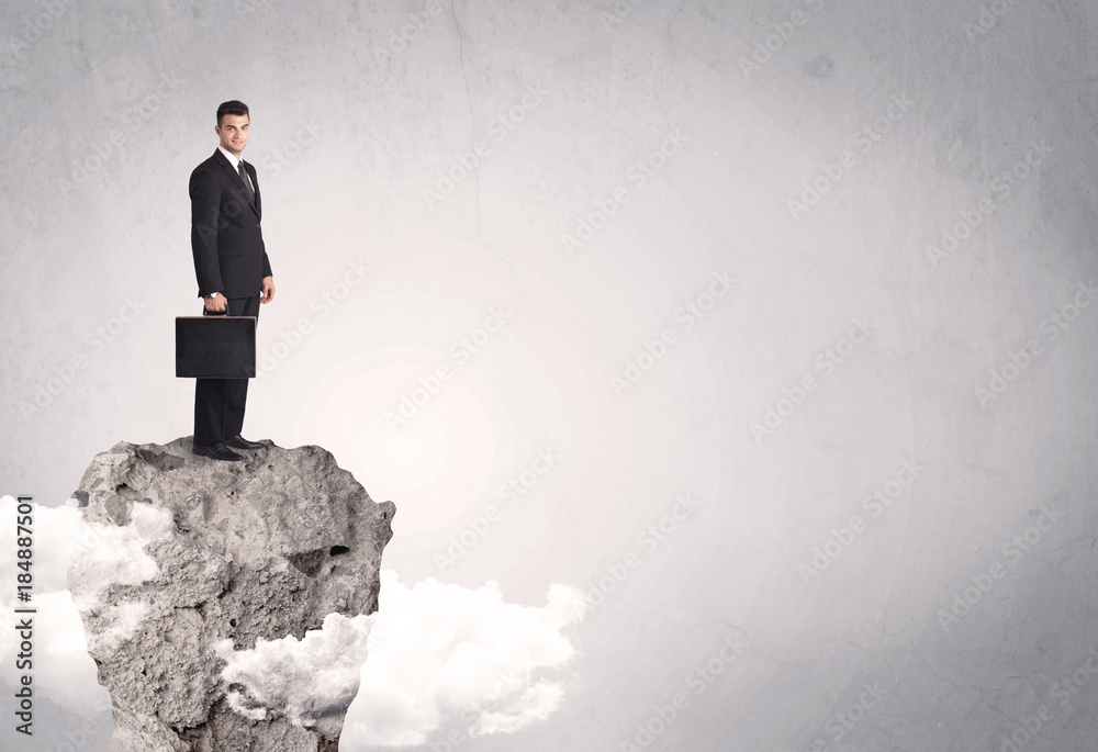 Best salesman on cliff in clear space Best salesman on cliff in clear space