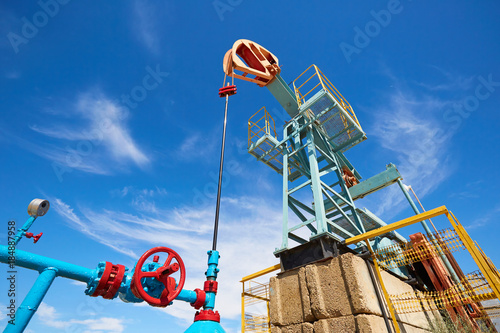 Pumpjack. A pumpjack is the overground drive for a reciprocating piston pump in an oil well. The arrangement is commonly used for onshore wells producing little oil. 