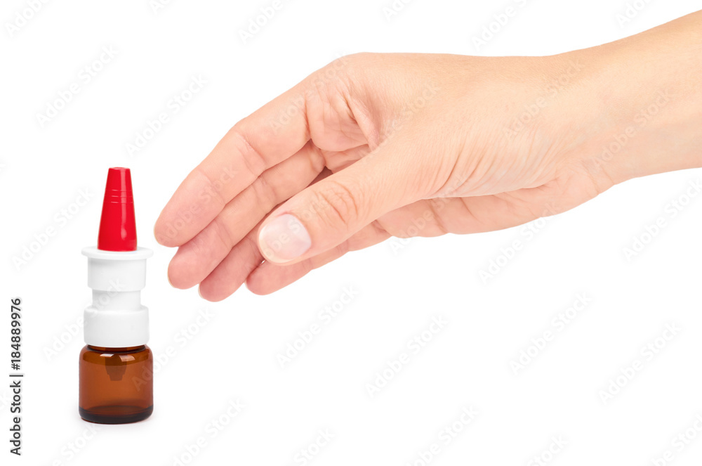 female hand holding nose spray bottle. Isolated on white background female hand holding nose spray bottle. Isolated on white background