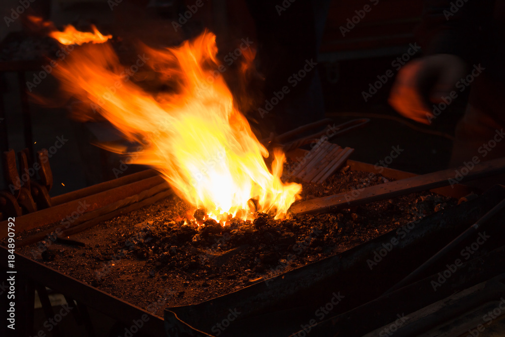 Blacksmiths coals burning for iron work