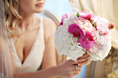 Wedding bouquet in bride hands