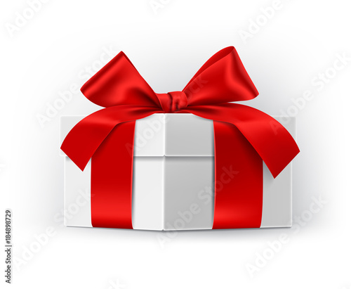 Gift boxes with red bows isolated on white background