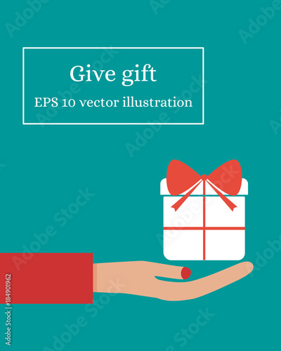Giving gift concept with female hand holding gift box