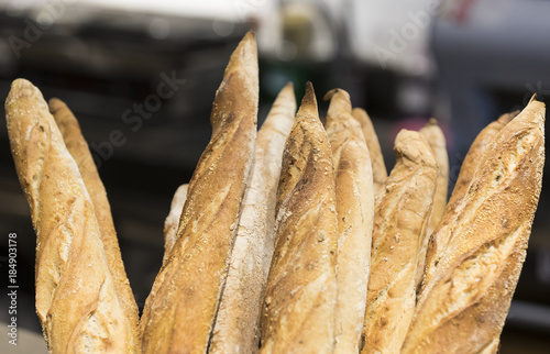 Rolls of fresh bread baking large closeup