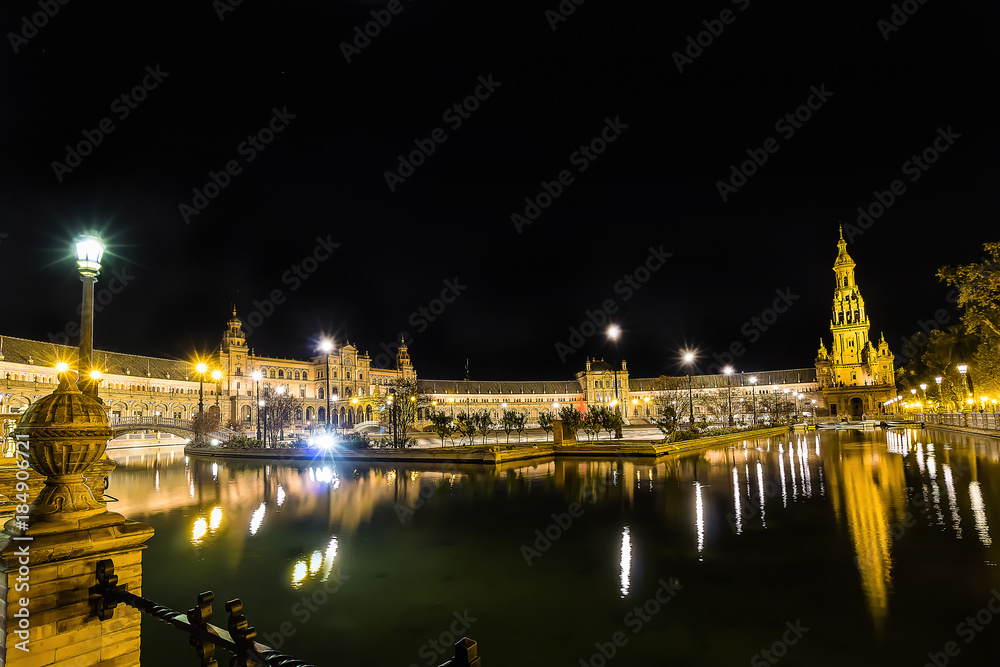 Spain Square (Plaza de Espana) at night, Seville, Spain, built on 1928, it is one example of the Regionalism Architecture mixing Renaissance and Moorish styles