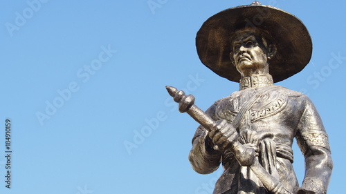 statue of King Taksin of Thonburi, The great king of Thailand isolated on blue sky background photo