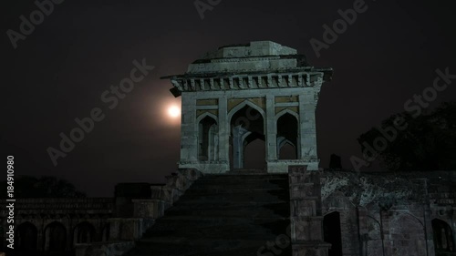 Time lapse Mandu India with moon, afghan ruins of islam kingdom, mosque monument and muslim tomb photo