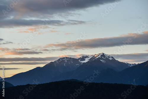 Snowy mountains with evening sun light in New Zealand