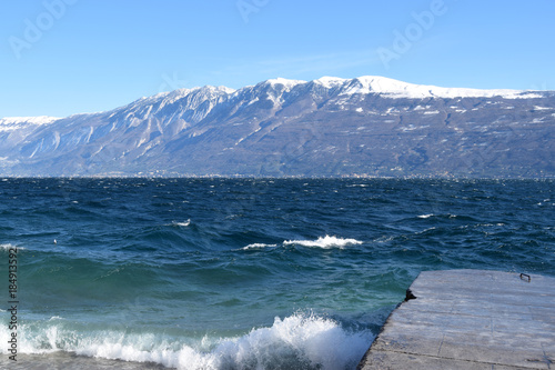 Fototapeta Naklejka Na Ścianę i Meble -  A panoramic view of Lake Garda on a stormy day - Brescia - Italy 016