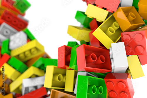 Pile of colored toy bricks isolated on white background. 3D illustration