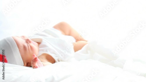 lovely asian baby girl in bed