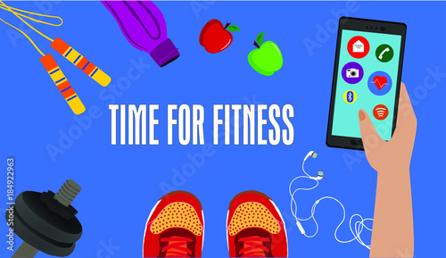 Fitness, healthy and active lifestyles concept. Dumbbells, sport shoes, smart phone with earphone and water bottle with word time for fitness. Hand holding smartphone with icons