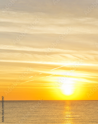 orange dawn over mediterranean sea in summer. for travel and naturalistic concept