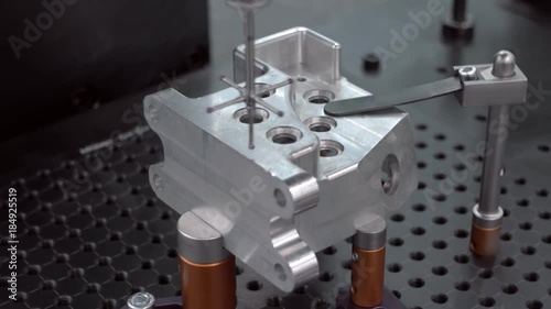 The probe of the coordinate measuring machine (CMM) touch to the detail under researching and introduces data to the computer