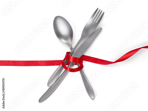 Fork, spoon and knife tied ...