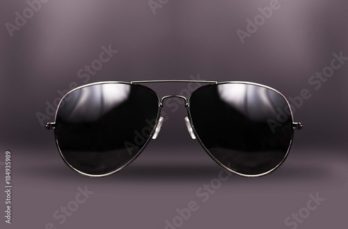 black sunglasses isolated on dark background
