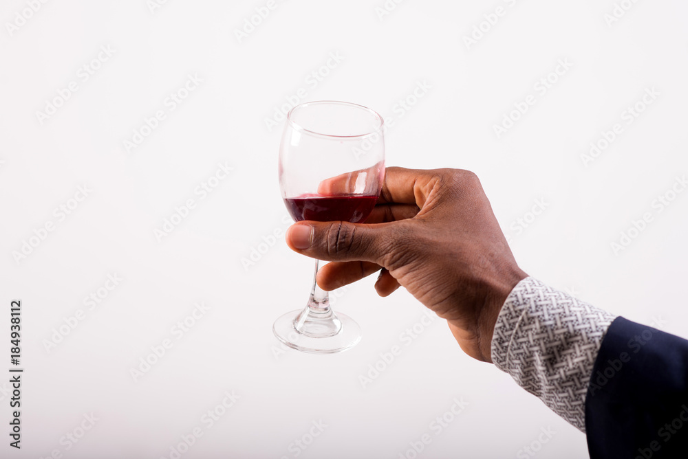 Glass of red wine in the hand