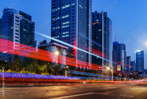 abstract image of blur motion of cars on the city road at night