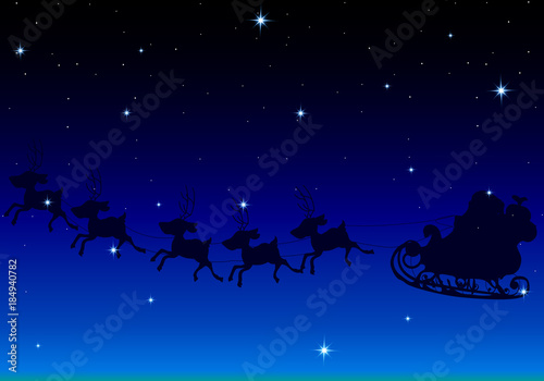 Santa Claus flies in the sky with the stars