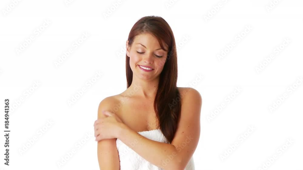 Attractive young female covered by white towel Attractive young female covered by white towel