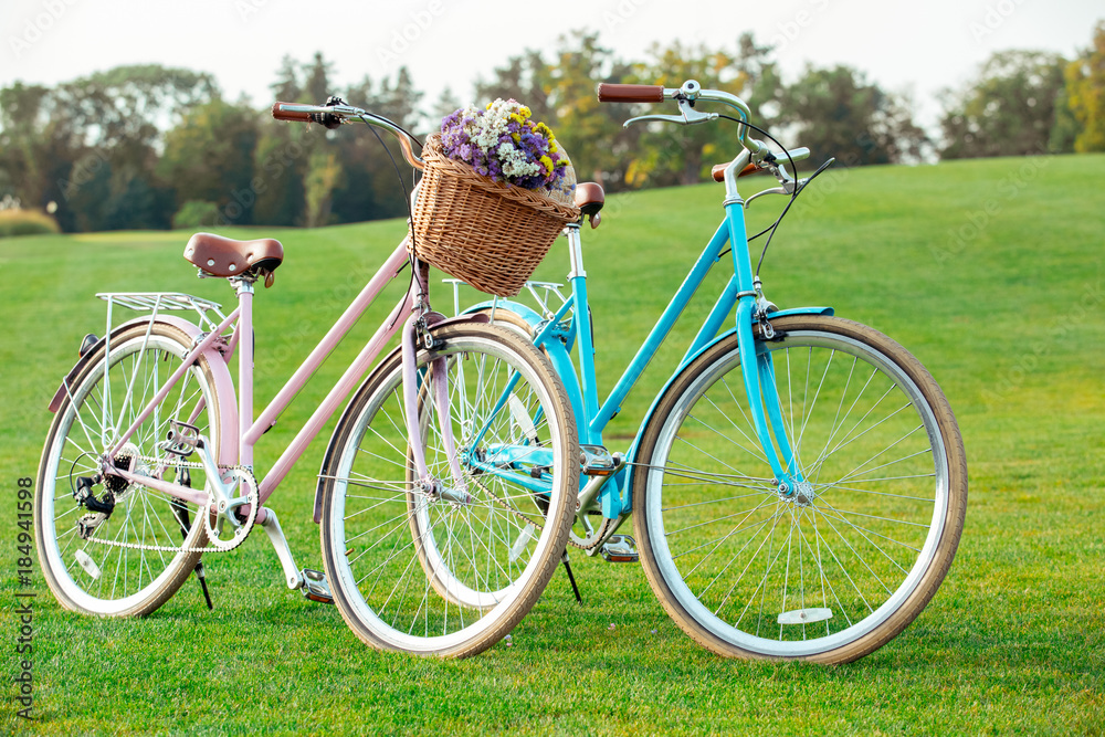 Couple riding bicycle together active lifestyle concept