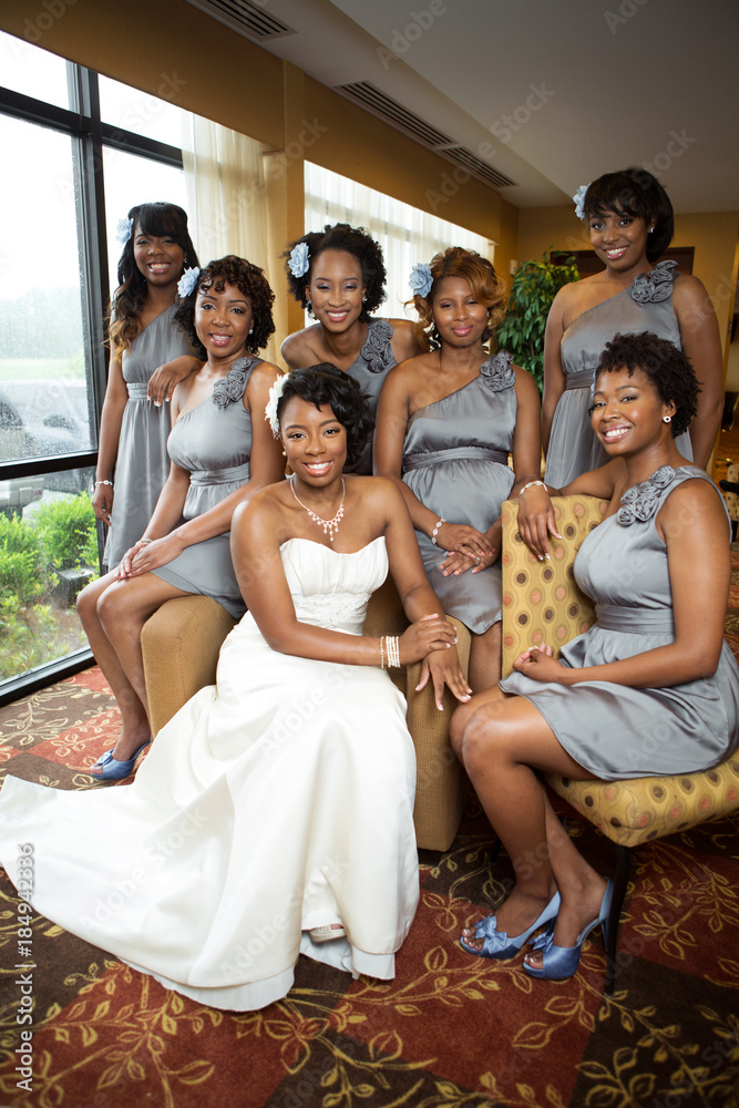 Bride and bridesmaid getting ready for her wedding. Bride and bridesmaid getting ready for her wedding.