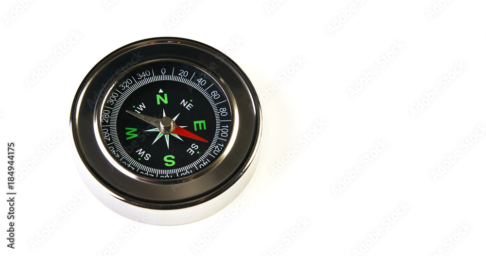Magnetic compass isolated on white background with copy space Magnetic compass isolated on white background with copy space