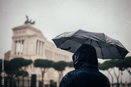 Men with umbrella