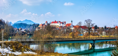 Old buildings of Fussen city. St. Mang Basilica, High Castle. Fussen, Germany. Panorama © olenatur