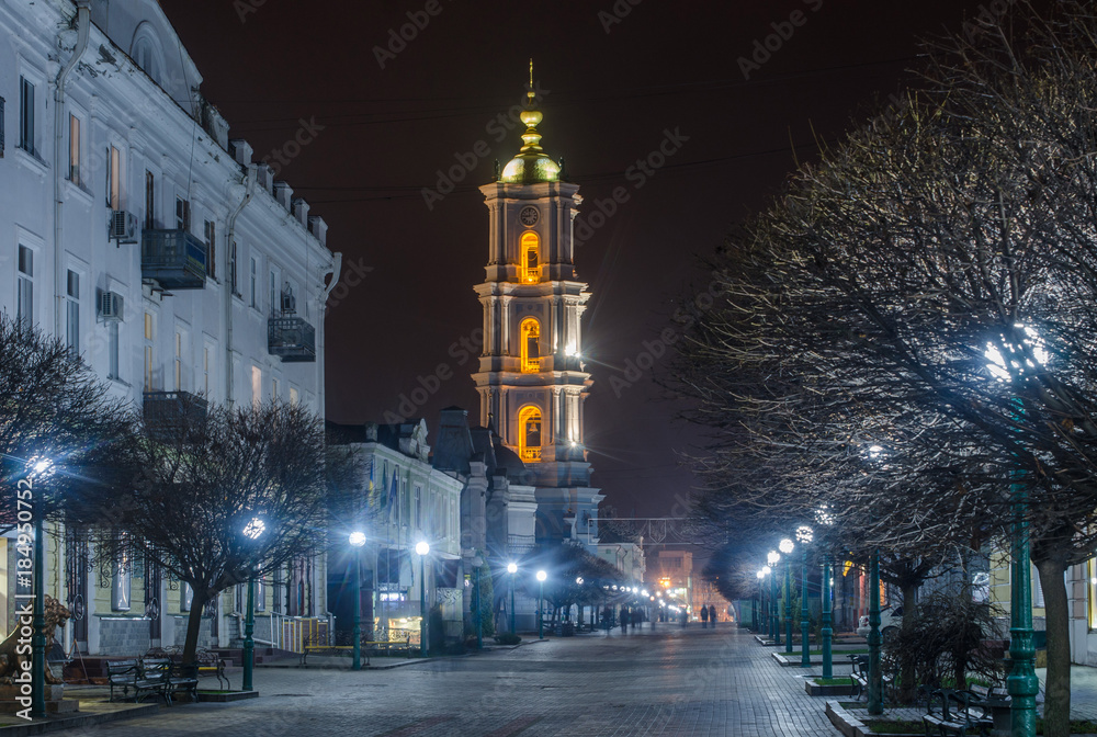 Fototapeta premium Belfry of the Cathedral with an evening architectural illumination