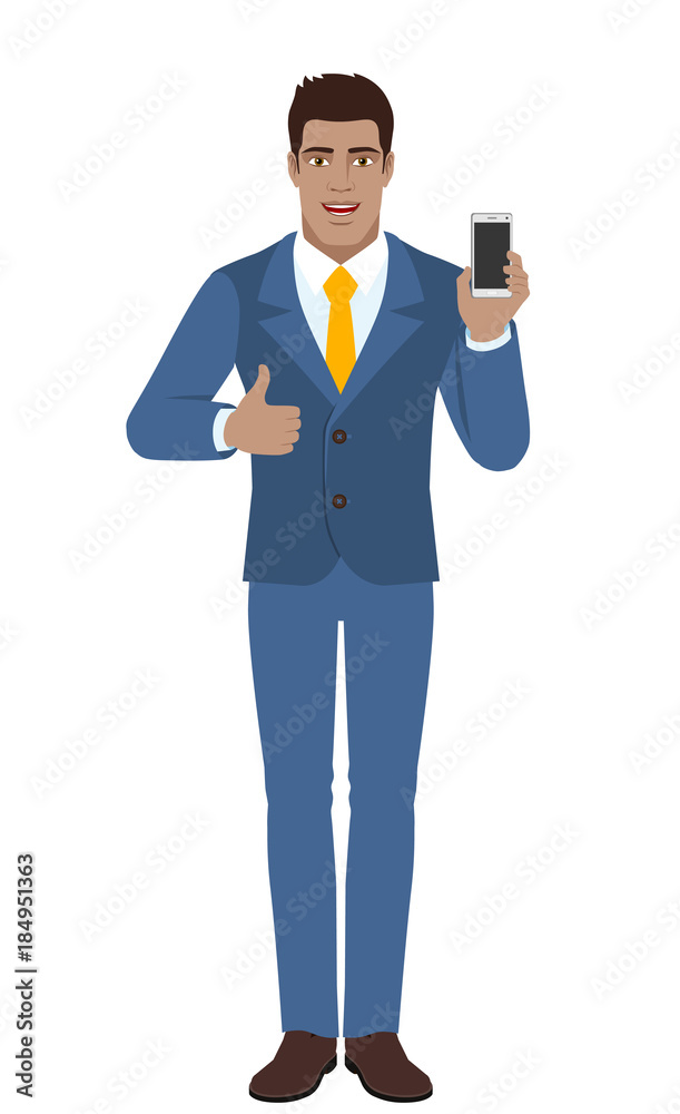Businessman with mobile phone showing thumb up Businessman with mobile phone showing thumb up