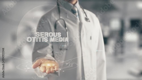 Doctor holding in hand Serous Otitis Media photo