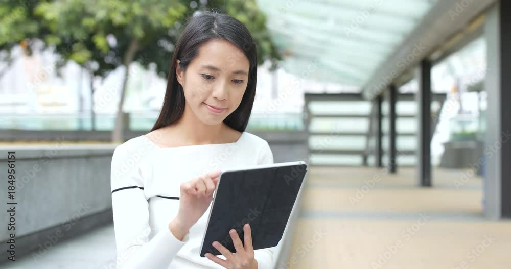 Young Woman holding with digital tablet computer
