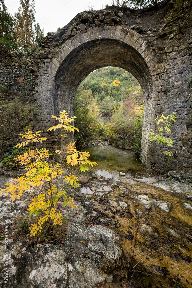 Montecatini Val di Cecina, Pisa, Italy - November 7, 2017: It is an itinerary in the Monterufoli Nature Reserve, monumental great work are the stone bridges
