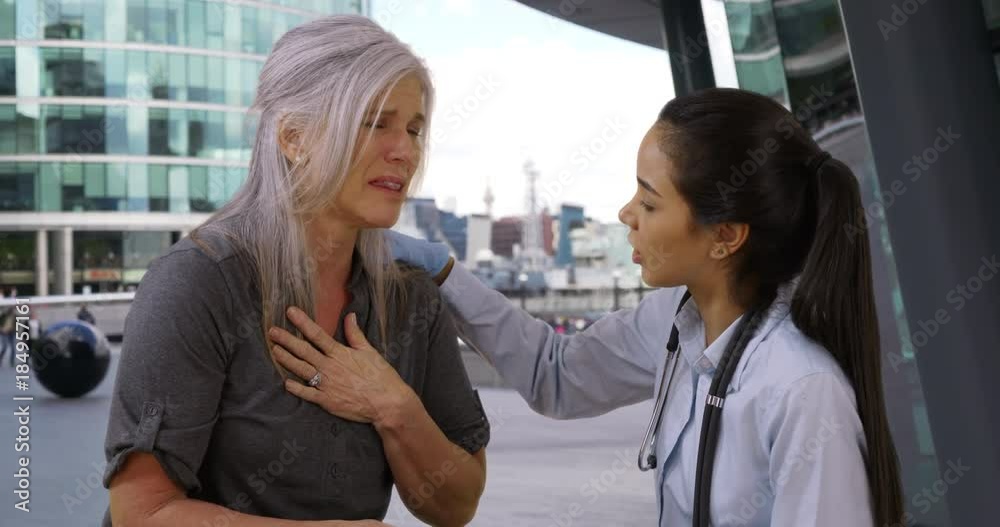 Colombian woman doctor assist mature woman who can't breathe downtown Colombian woman doctor assist mature woman who can't breathe downtown