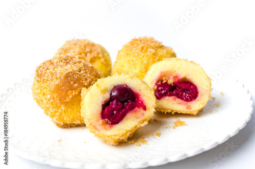Homemade bread crumb dumplings with cherry isolated