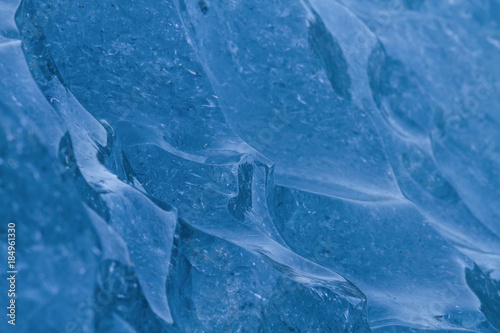 Blue glacial ice close up