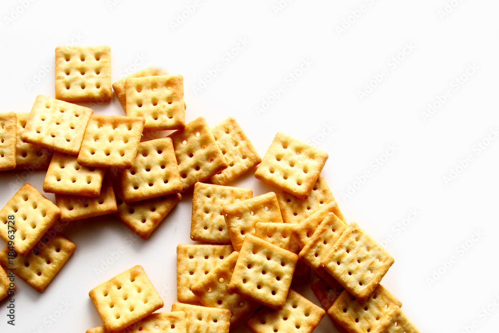 Cracker biscuit as wallpaper / A cracker is a baked food typically made from flour.