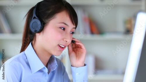 young asian customer service girl working