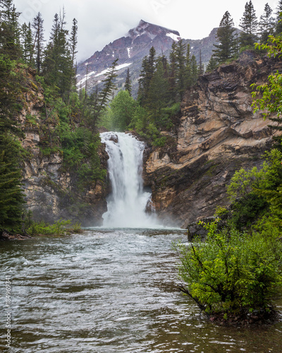 Twin Falls Waterfall in Glacier National Park Montana photo